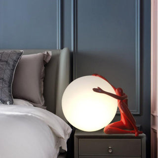 Humanoid Ball Holding Table Lamp Arkstarhome