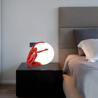 Humanoid Ball Holding Table Lamp Arkstarhome