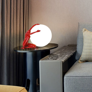 Humanoid Ball Holding Table Lamp Arkstarhome