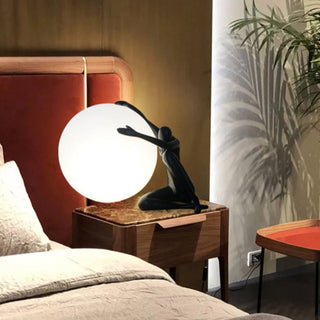 Humanoid Ball Holding Table Lamp Arkstarhome