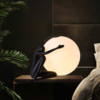 Humanoid Ball Holding Table Lamp Arkstarhome