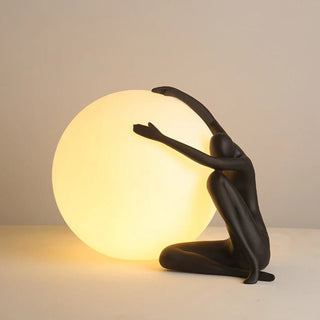 Humanoid Ball Holding Table Lamp Arkstarhome