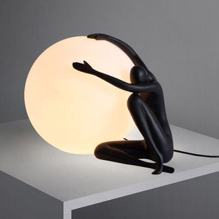 Humanoid Ball Holding Table Lamp Arkstarhome