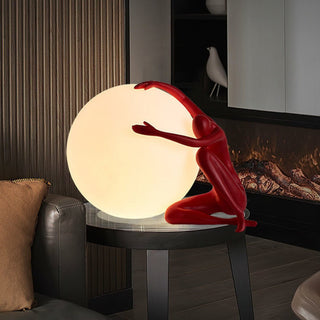 Humanoid Ball Holding Table Lamp Arkstarhome
