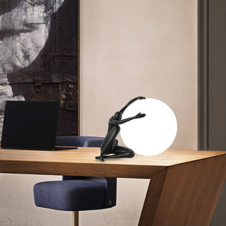 Humanoid Ball Holding Table Lamp Arkstarhome