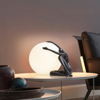 Humanoid Ball Holding Table Lamp Arkstarhome